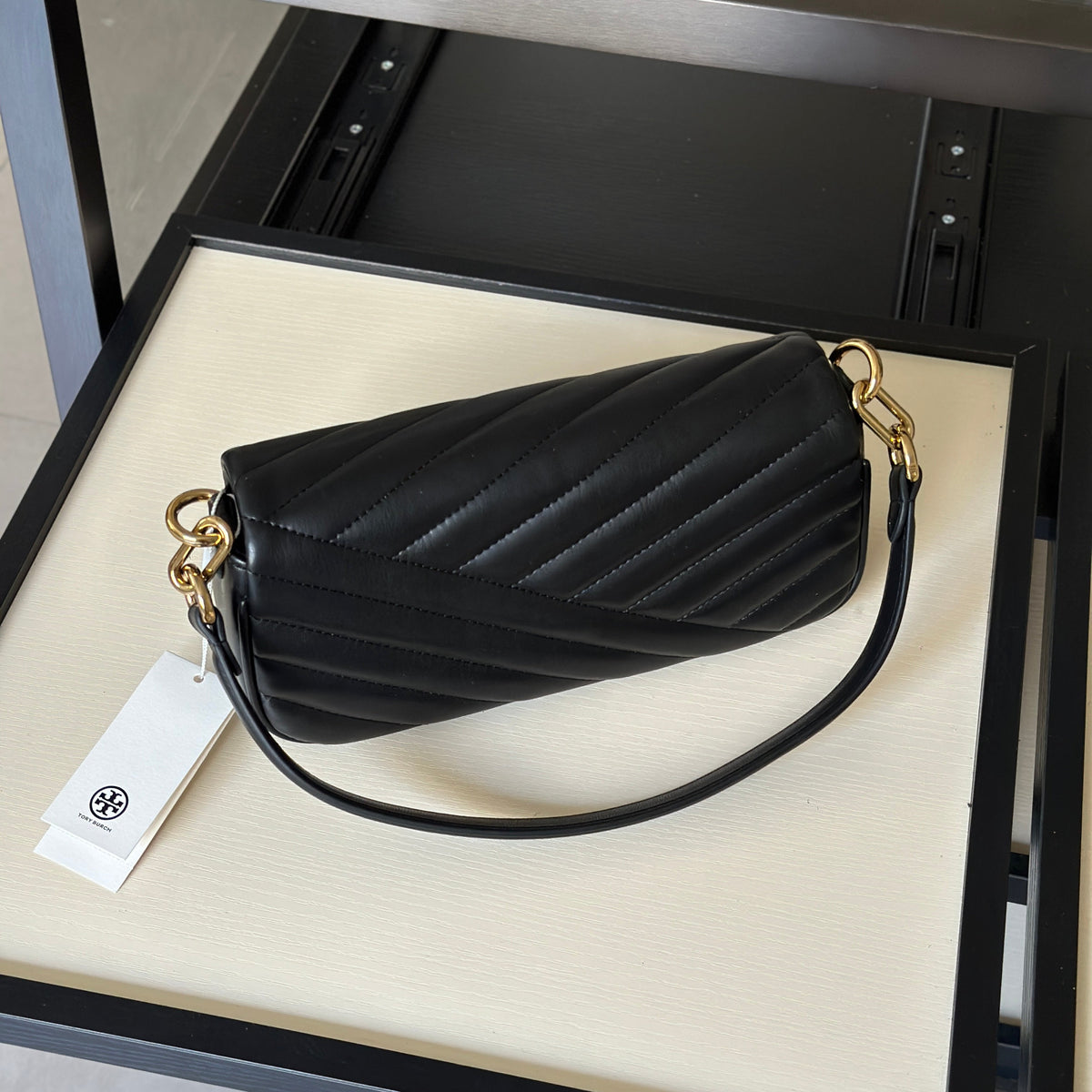THE KIRA CHEVRON SMALL FLAP SHOULDER BAG - BLACK