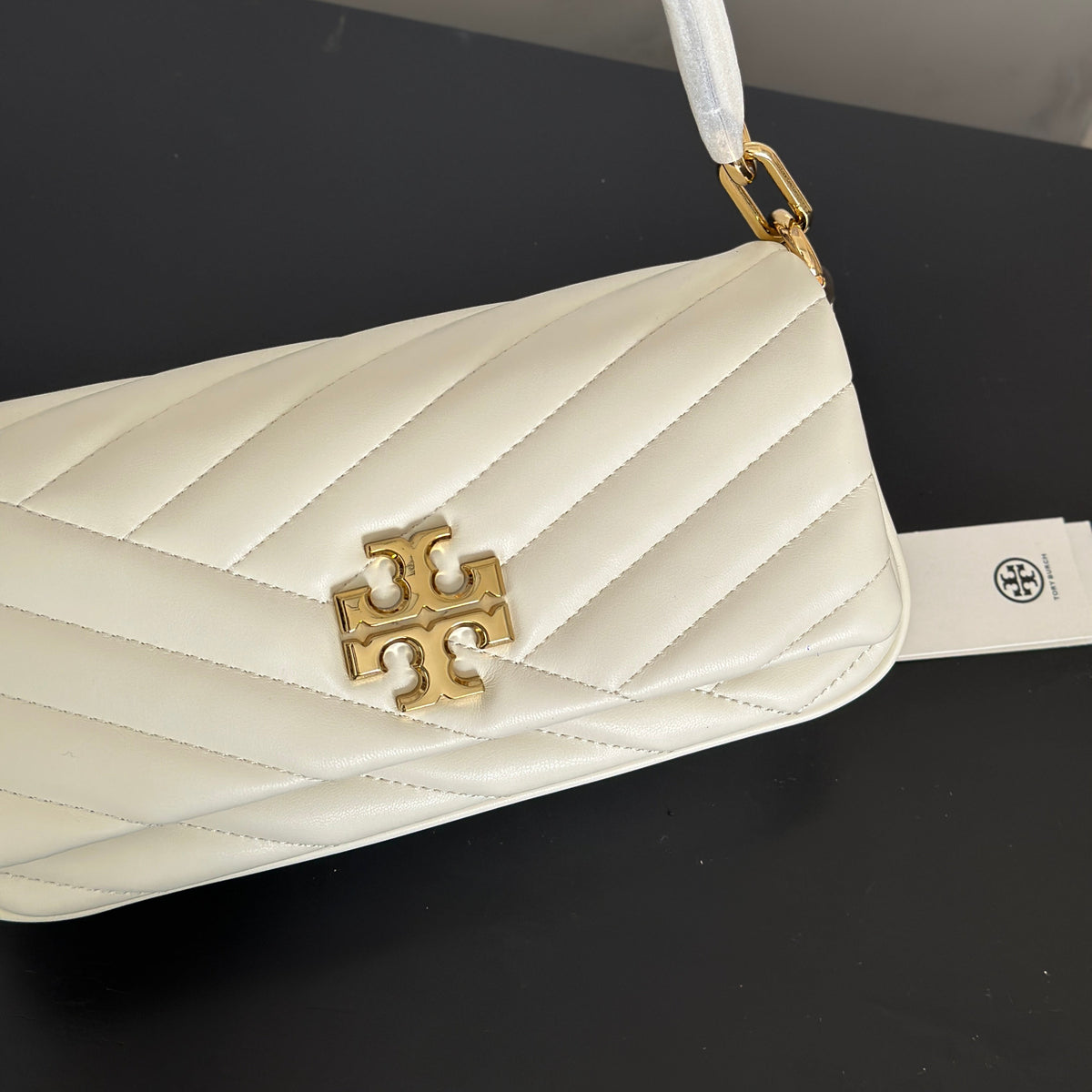 THE KIRA CHEVRON SMALL FLAP SHOULDER BAG - WHITE