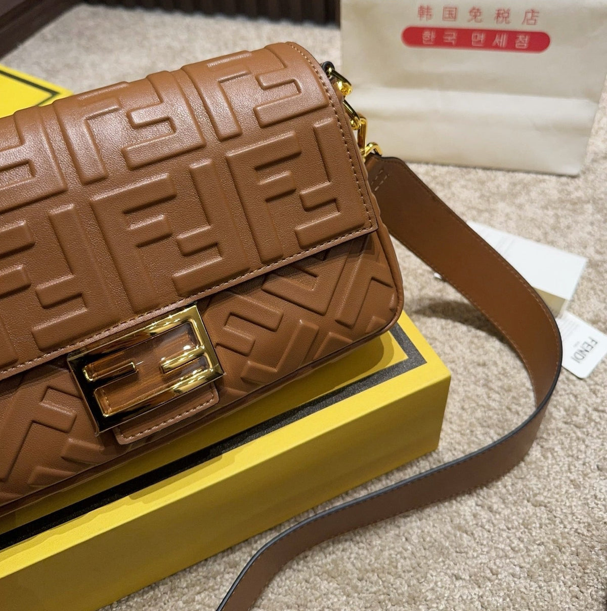 MINI EMBOSSED BAGUETTE BAG – BROWN