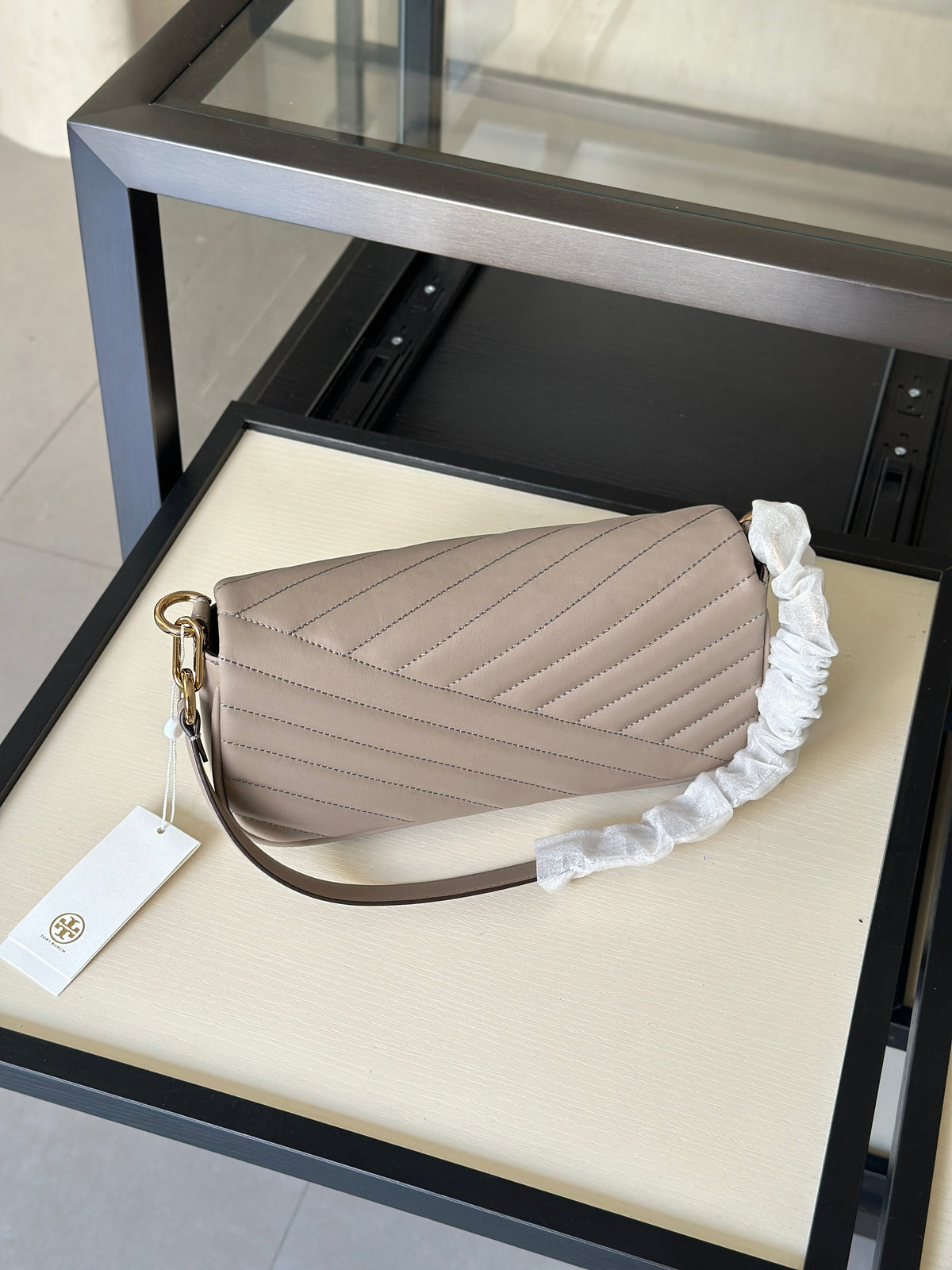 THE KIRA CHEVRON SMALL FLAP SHOULDER BAG - STONE