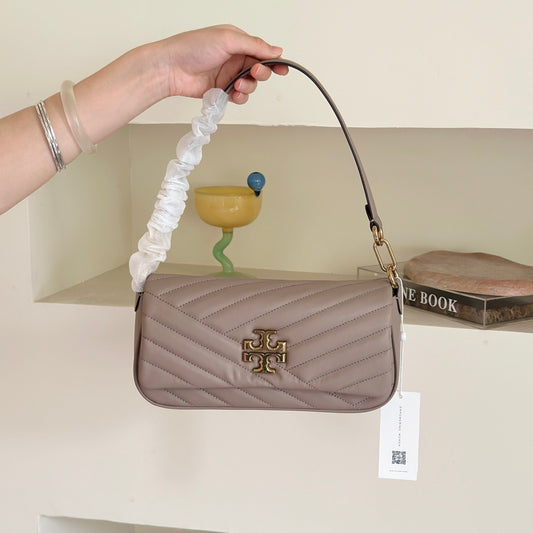 THE KIRA CHEVRON SMALL FLAP SHOULDER BAG - STONE
