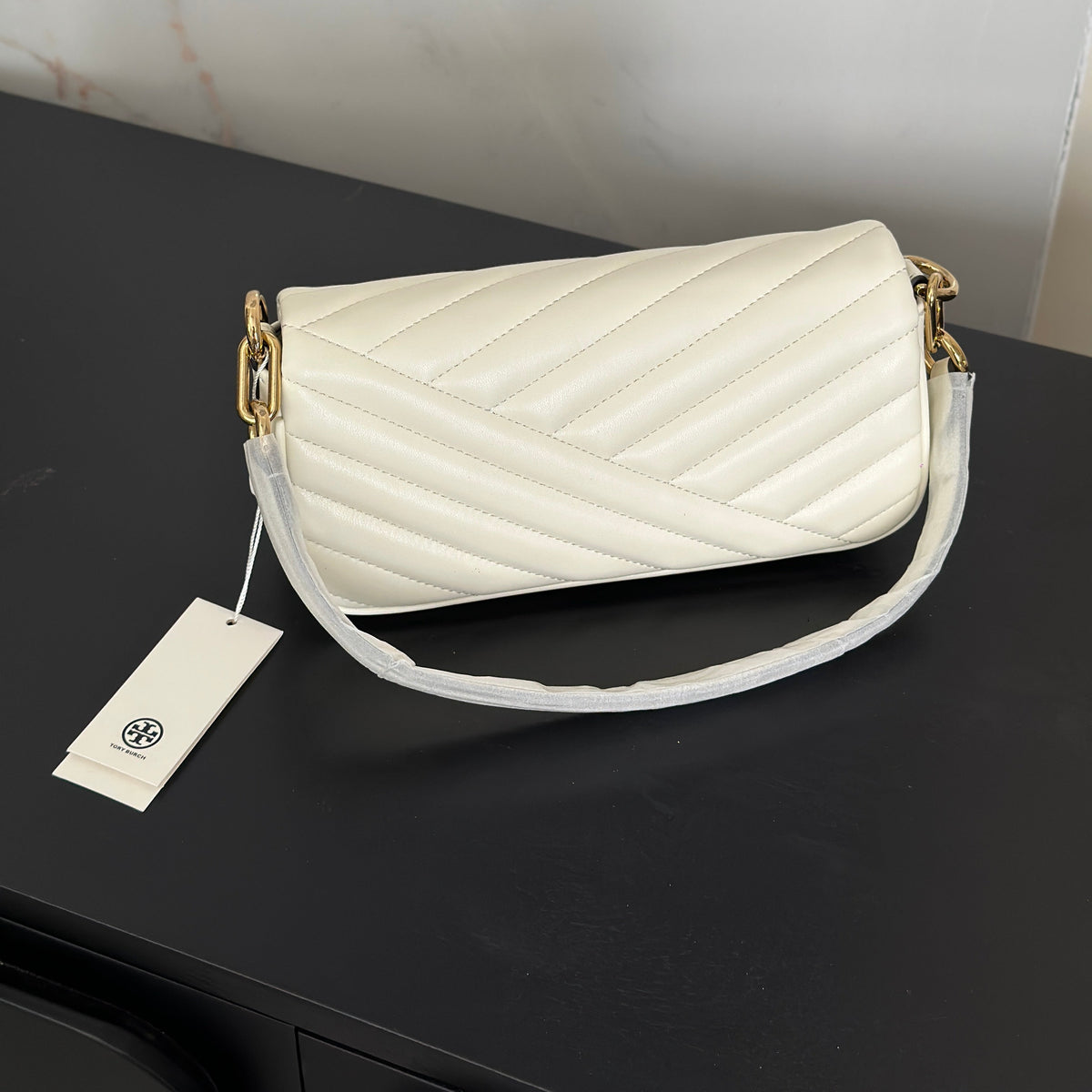 THE KIRA CHEVRON SMALL FLAP SHOULDER BAG - WHITE