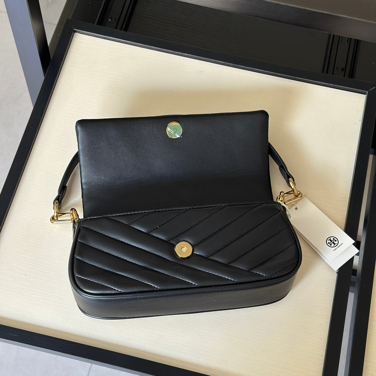 THE KIRA CHEVRON SMALL FLAP SHOULDER BAG - BLACK
