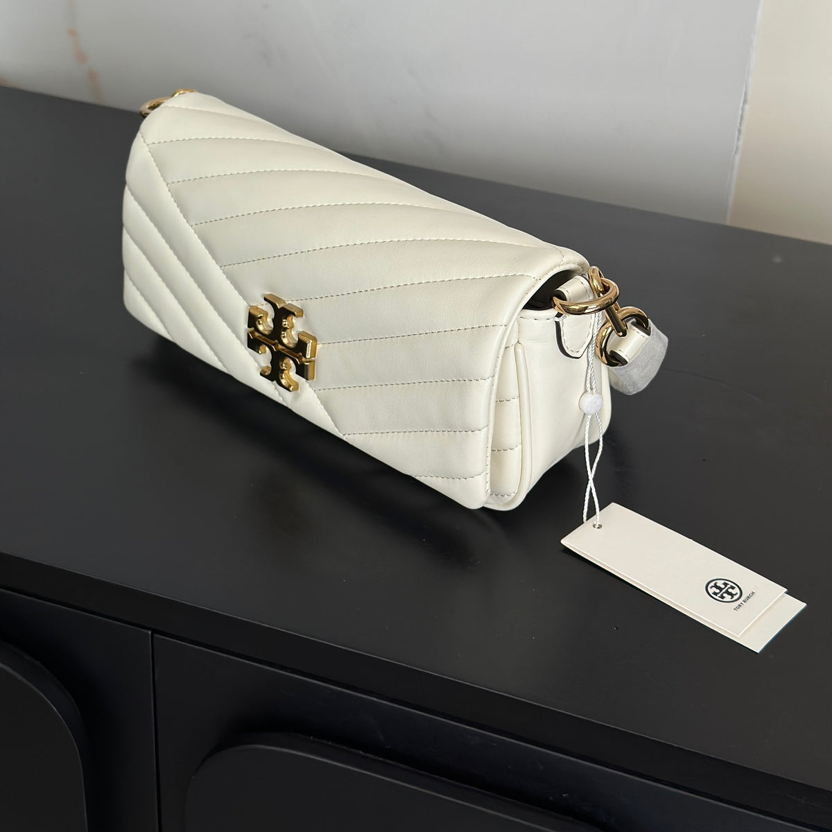 THE KIRA CHEVRON SMALL FLAP SHOULDER BAG - WHITE