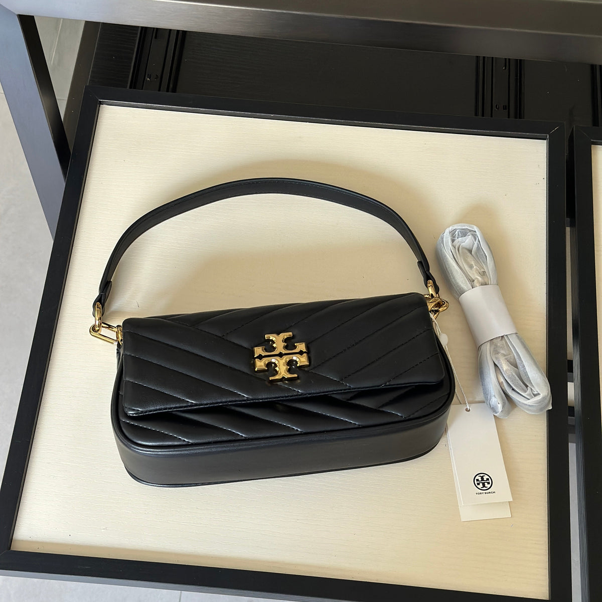 THE KIRA CHEVRON SMALL FLAP SHOULDER BAG - BLACK